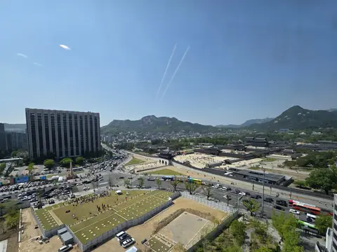 Aerial view of the palace grounds with the mountains behind
